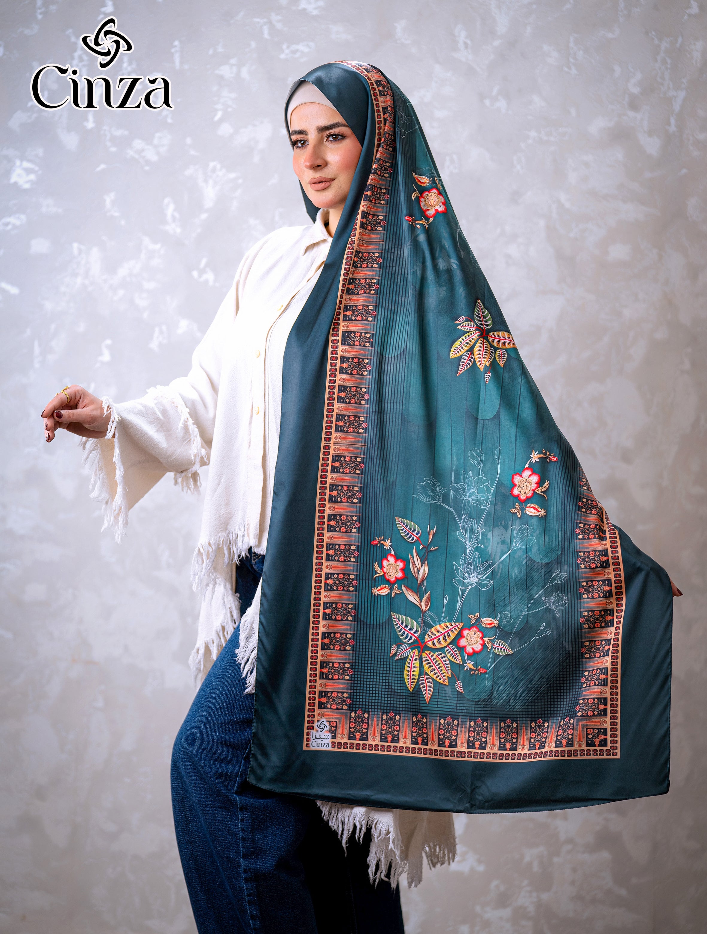 Teal floral printed satin hijab styled on model