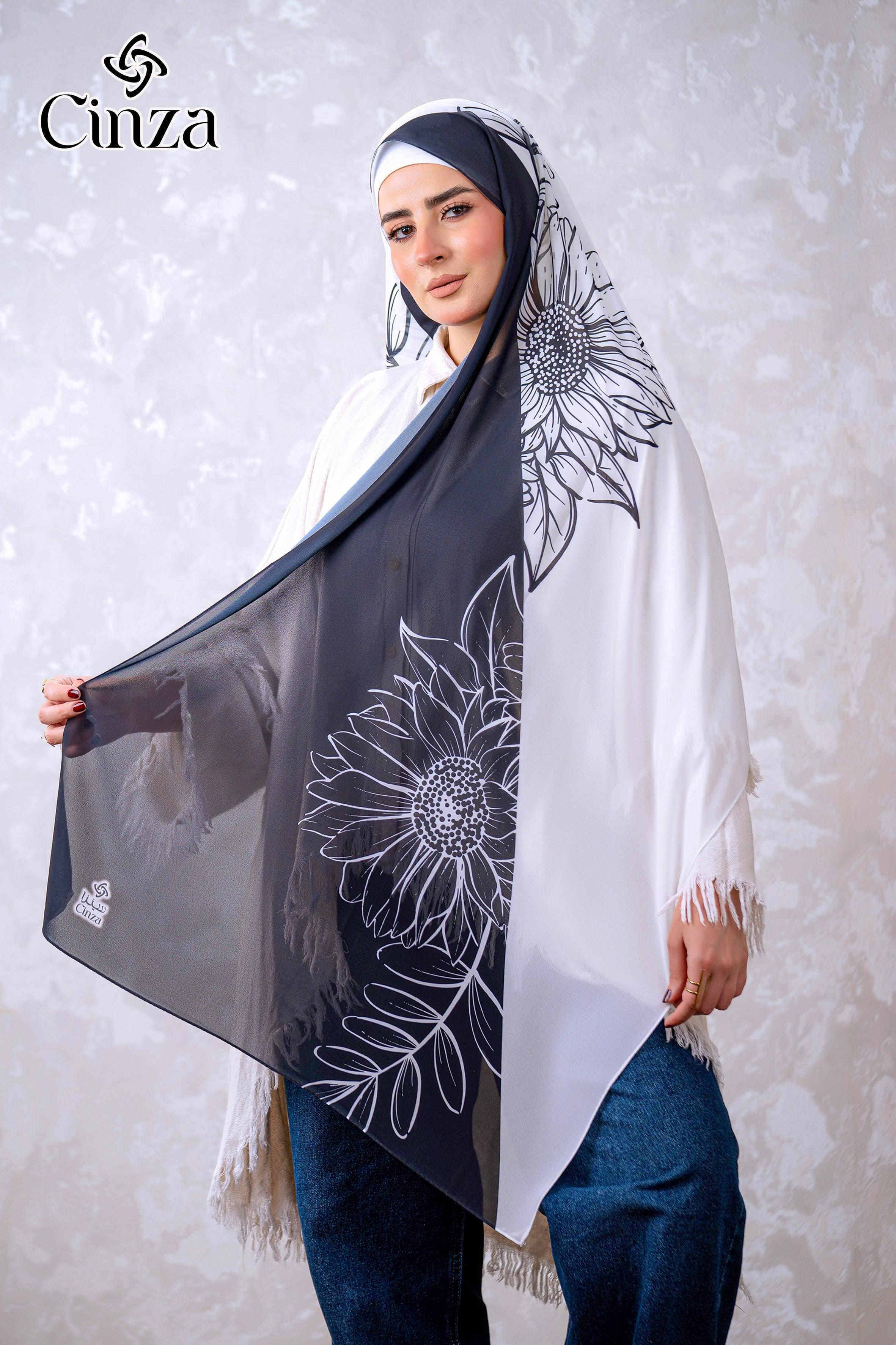 Woman wearing black and white printed chiffon hijab with floral design