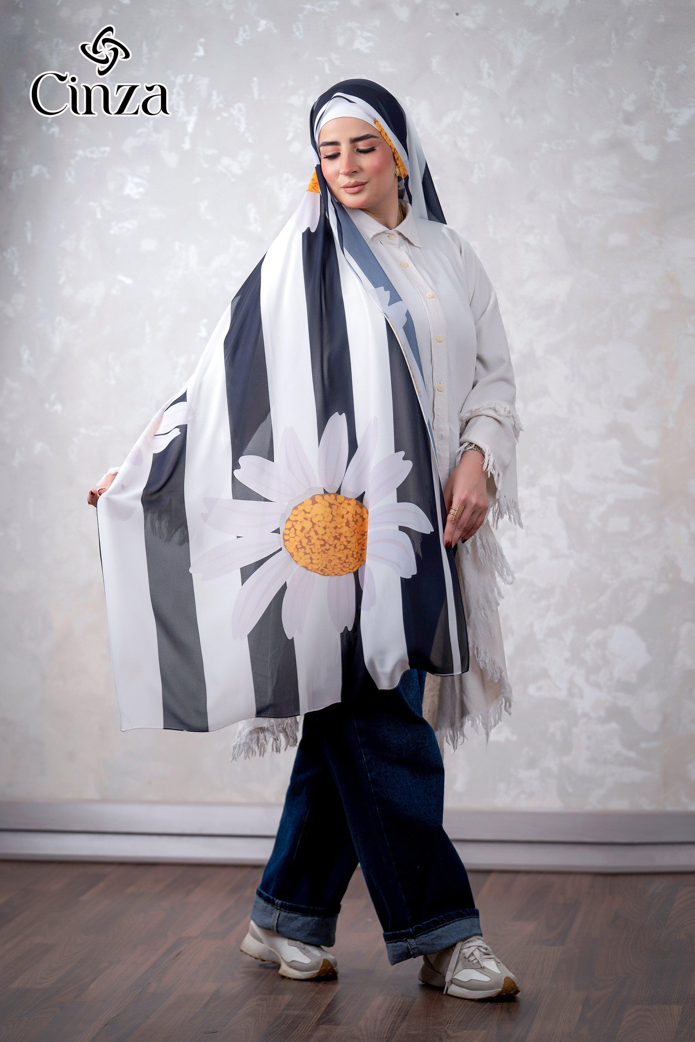 Woman wearing black and white printed chiffon hijab with sunflower design
